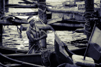 Nettoyage des filets de pêche à Cochin